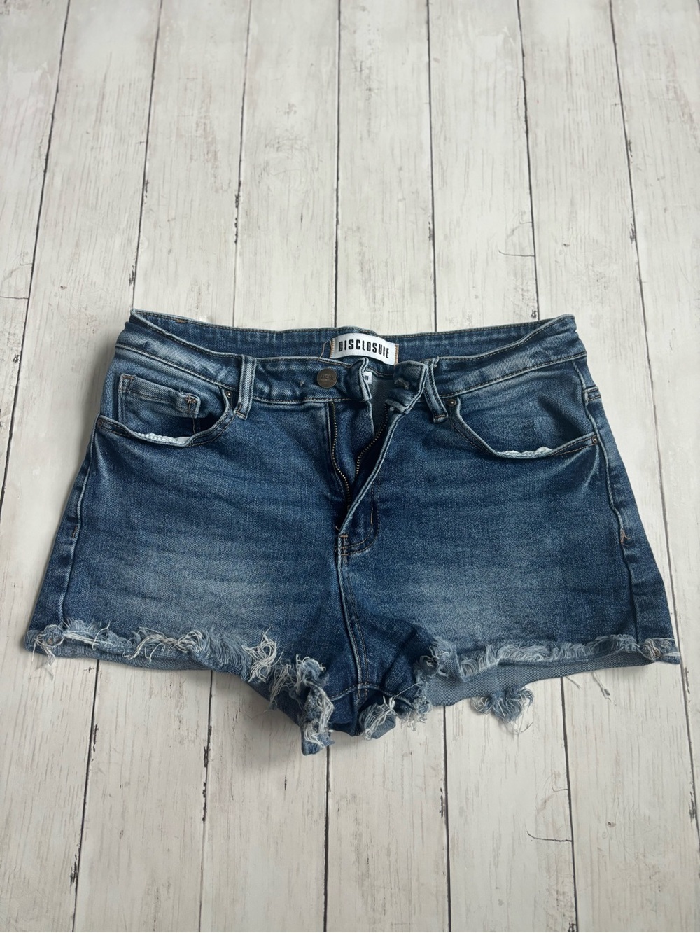 Disclosure Distressed Mid-Rise Denim Shorts